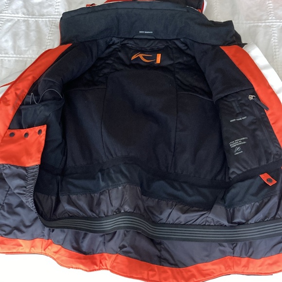 Kjus women’s ski jacket. Gorgeous, classic white with black & orange detailing. - Picture 3 of 9